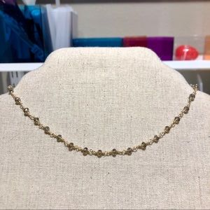 grey and gold chain choker